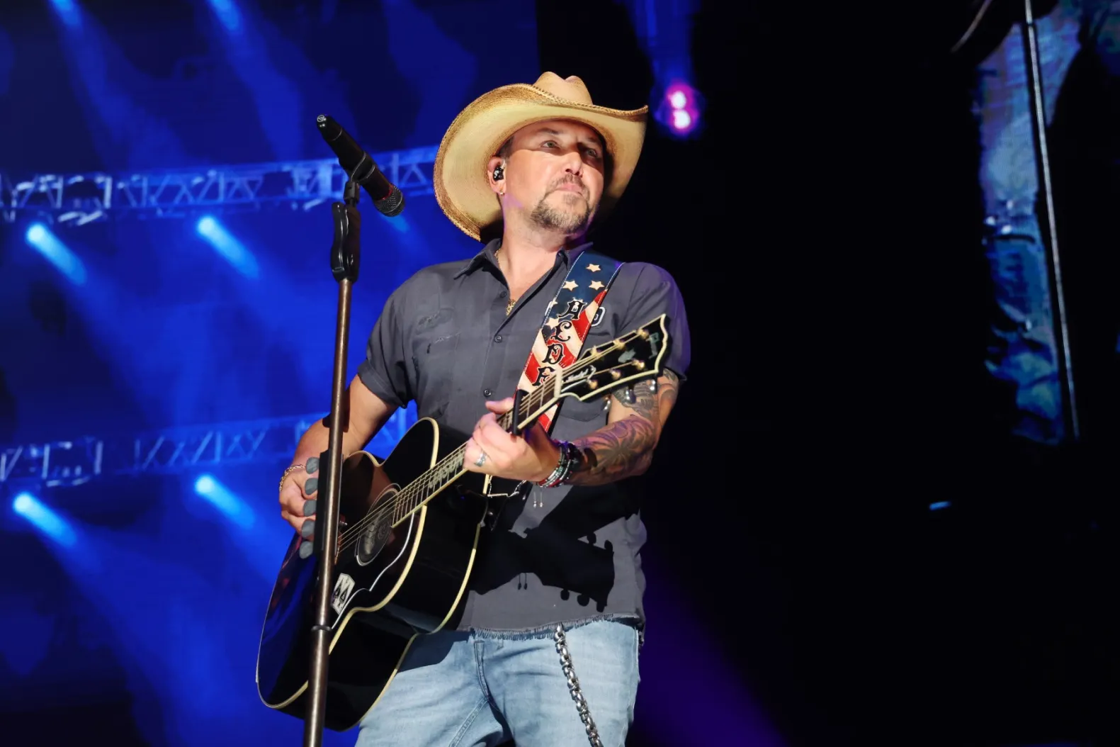 Jason Aldean performing on tour